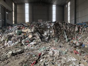 Sorted concrete and brick debris ready for crushing